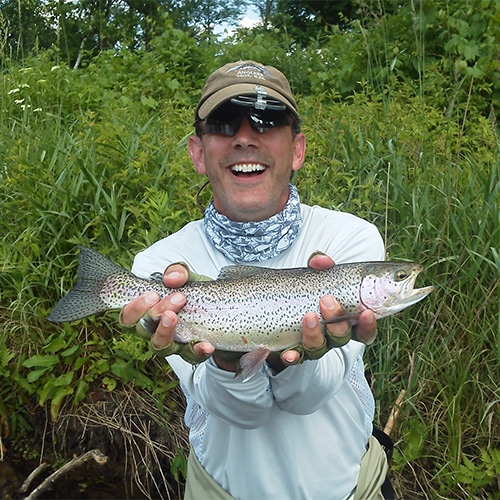 Brian with his great catch from fly fishing.